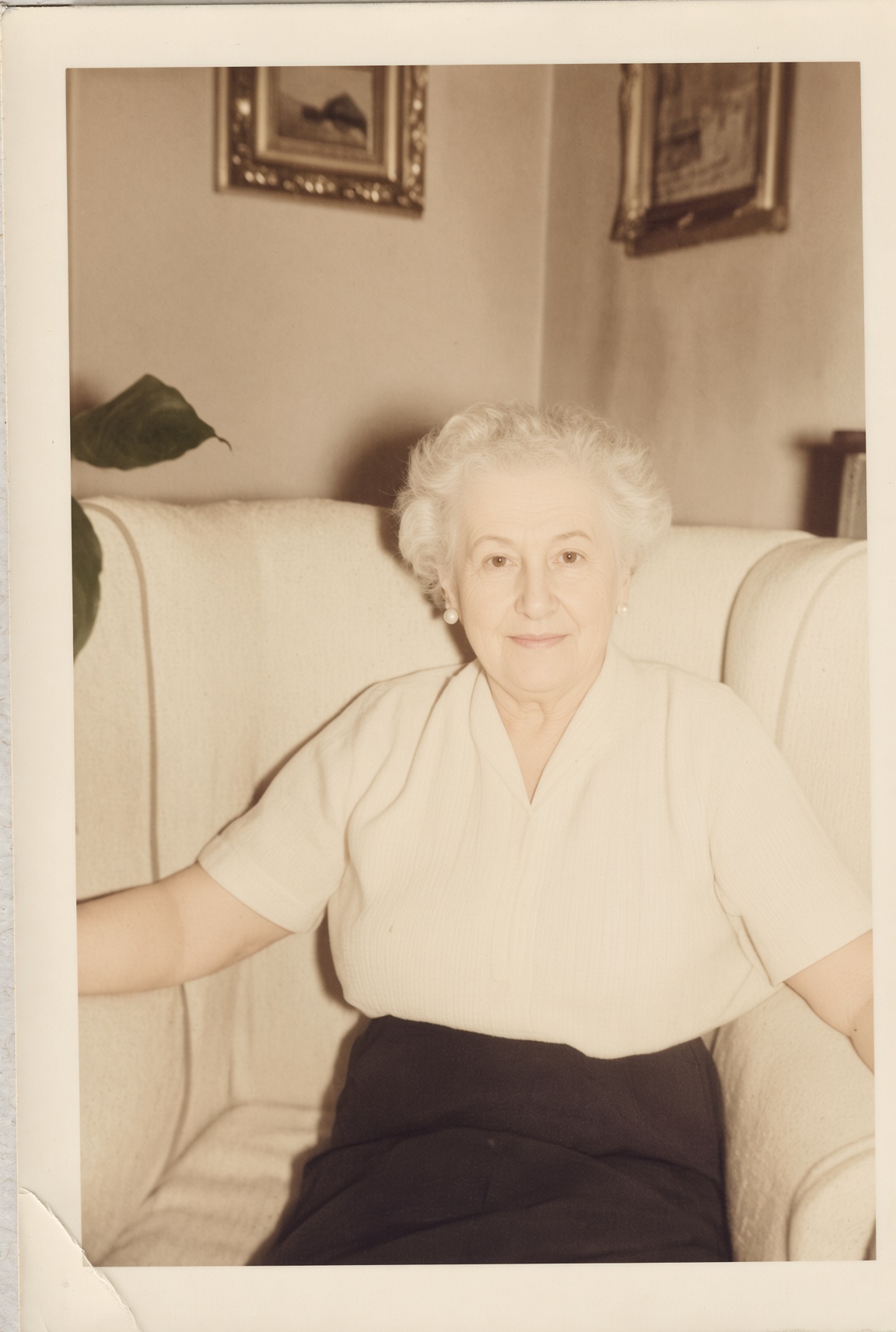 Adjusted presentation copy of the late-life portrait of Margarete Mutti Reichenbach seated in an upholstered armchair
