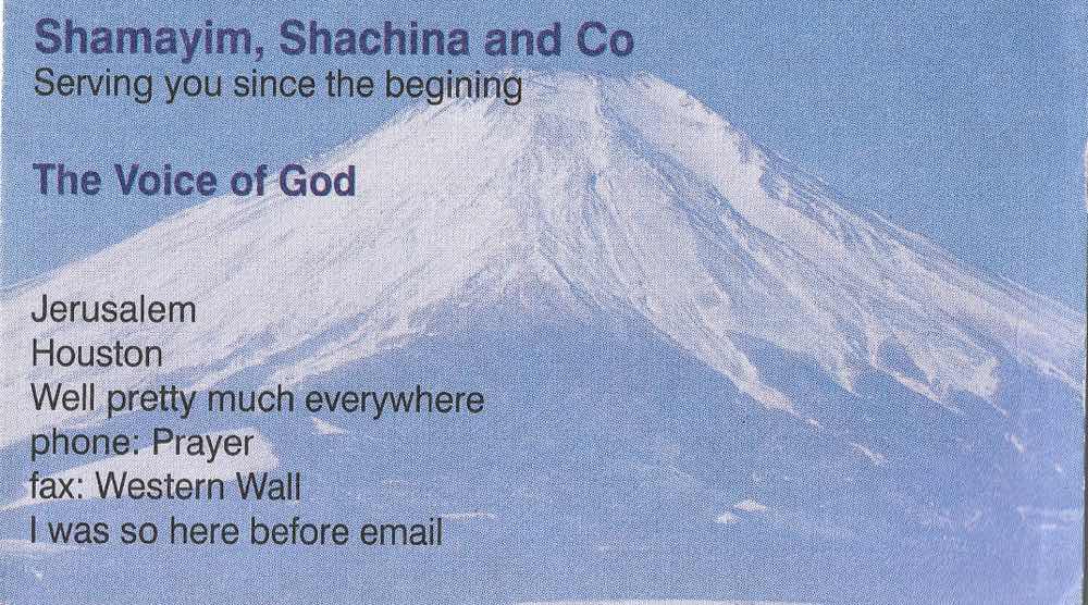 Humorous blue business card naming Paul J. Reichenbach the Voice of God, with a mountain and rays of light behind the text