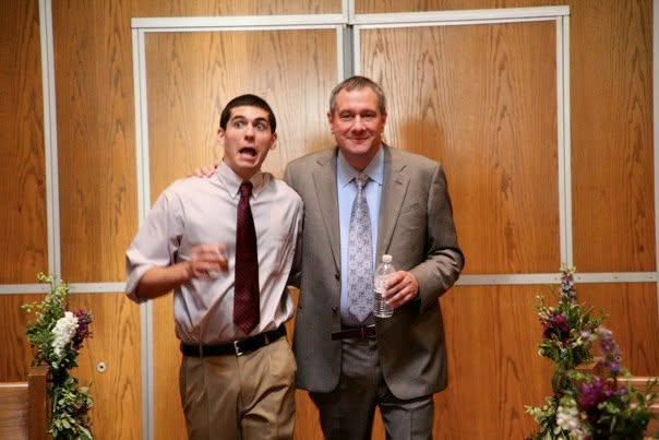 Rabbi Daniel Dolph Reichenbach standing playfully beside his father Paul J. Reichenbach at a family event