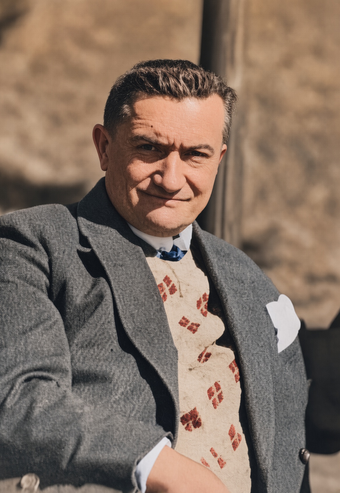 Color-adapted presentation view of the late-life portrait of Paul Reichenbach seated outdoors